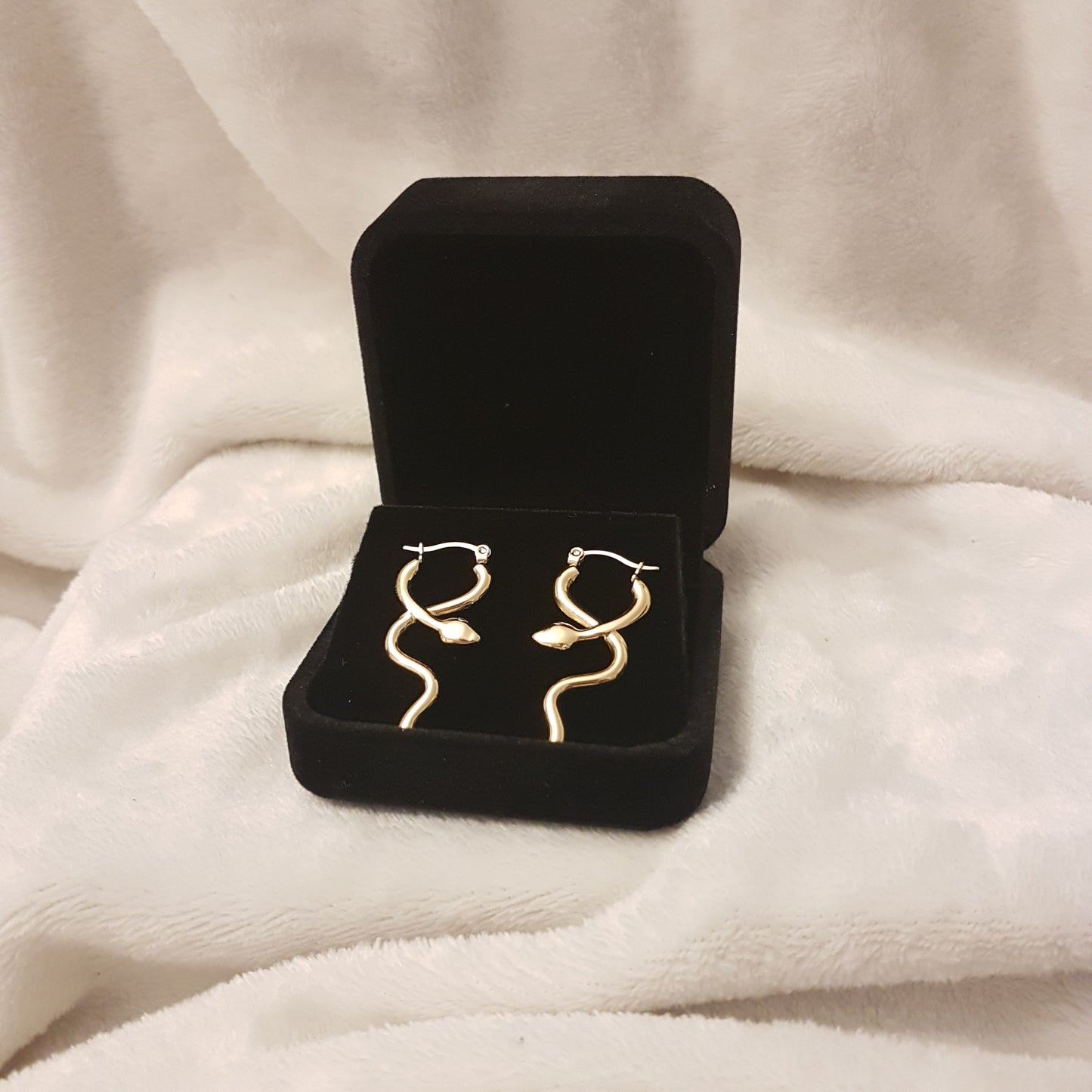 Serpent malicieux brillant